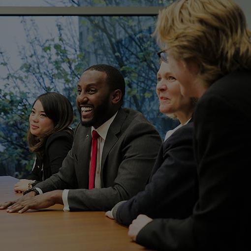 photo of employees in meeting